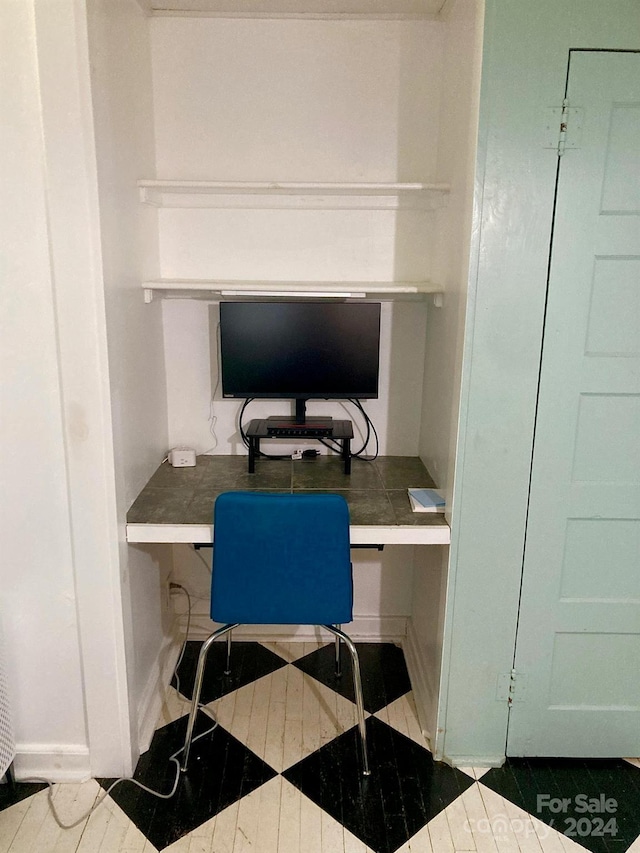 office space featuring built in desk