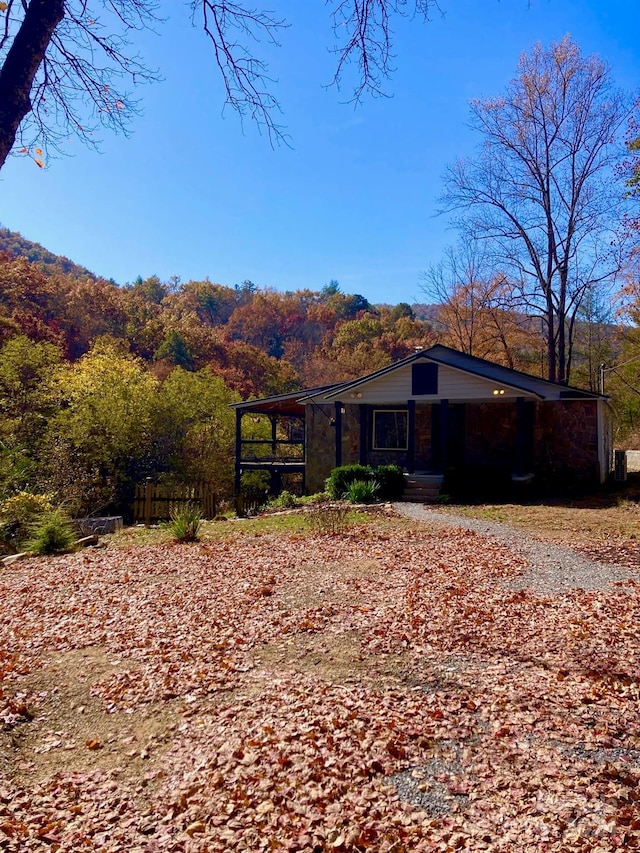 17 Moonlight Trl, Bryson City, NC 28713 - view of home's exterior with a wooded view