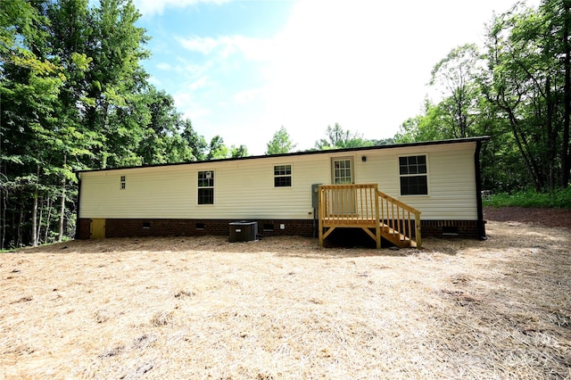 view of front of house with central air condition unit