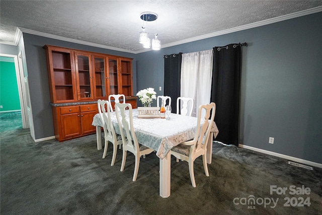 carpeted dining space with crown molding and a textured ceiling