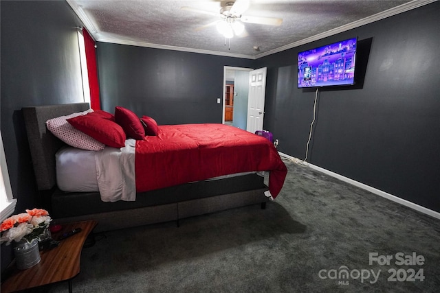 carpeted bedroom with ceiling fan, a textured ceiling, and ornamental molding