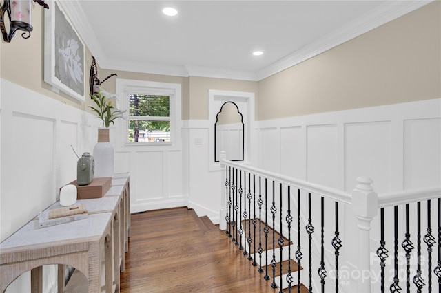 corridor featuring dark hardwood / wood-style floors and ornamental molding