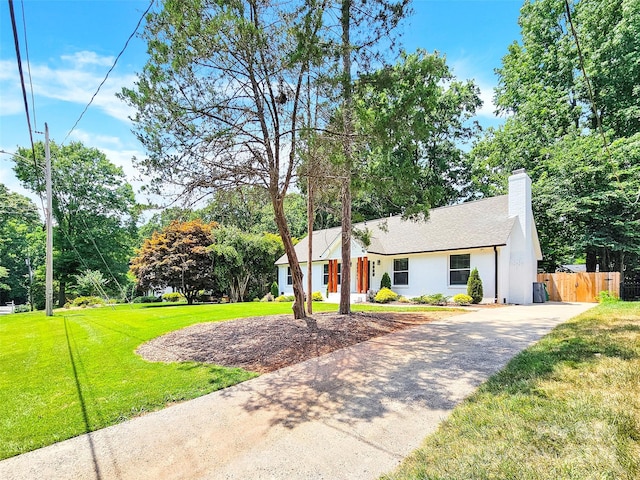 view of front of home with a front lawn