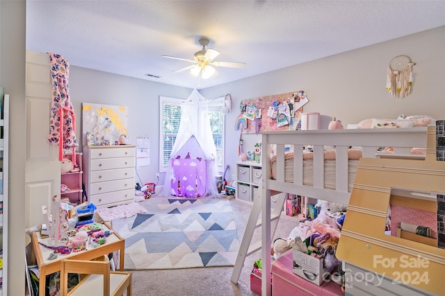 bedroom with ceiling fan and carpet floors