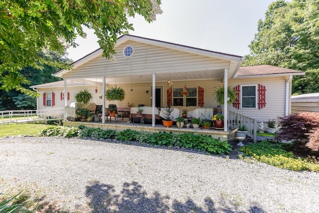 view of front of property featuring covered porch