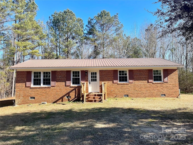 single story home with a front yard