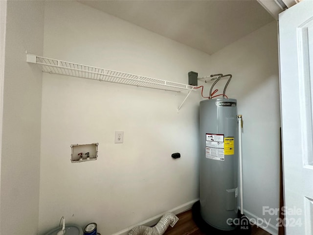 washroom featuring hookup for a washing machine, electric water heater, electric dryer hookup, and wood-type flooring