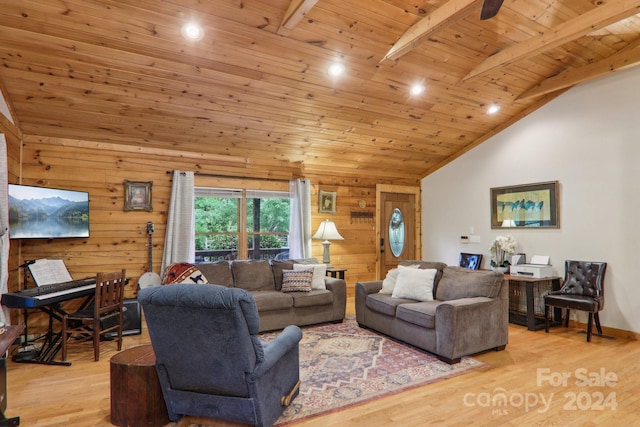 living room featuring light wood-type flooring, wooden ceiling, beam ceiling, and wood walls