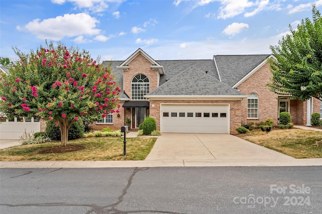 front of property with a garage