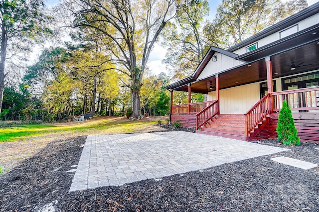 exterior space with a patio area and ceiling fan