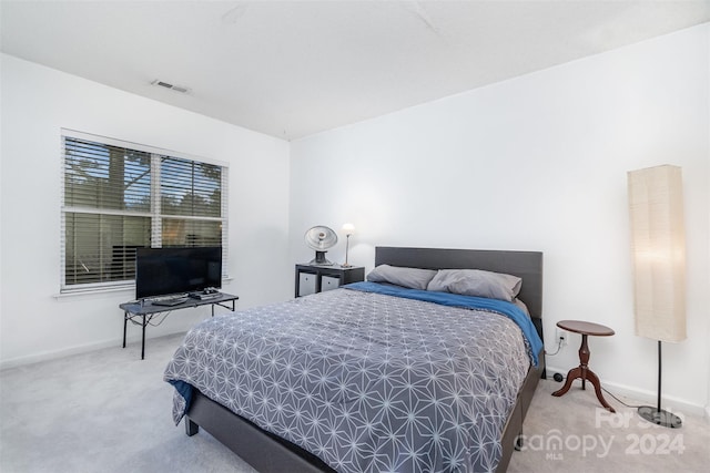 bedroom featuring carpet