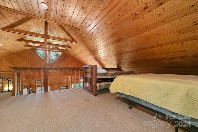 bedroom with carpet flooring, lofted ceiling with skylight, and wood ceiling