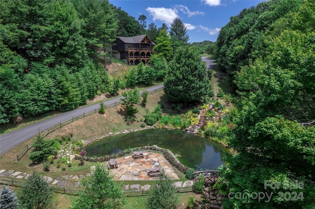 bird's eye view with a water view