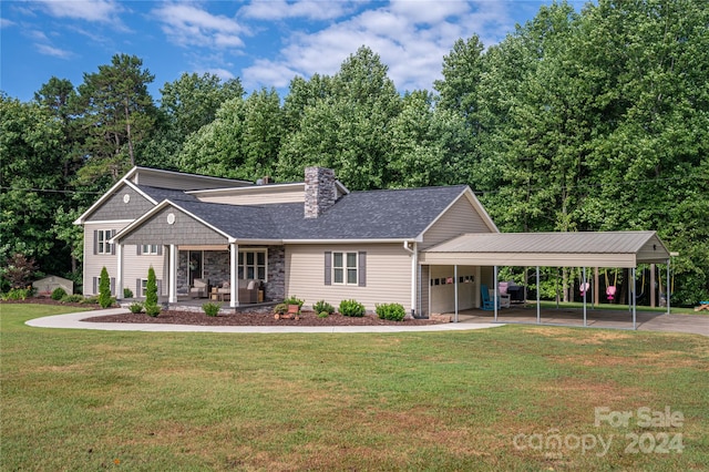 view of front facade with a porch, a front lawn, and a carport