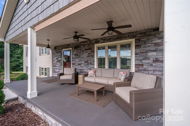 view of patio / terrace featuring ceiling fan and an outdoor hangout area