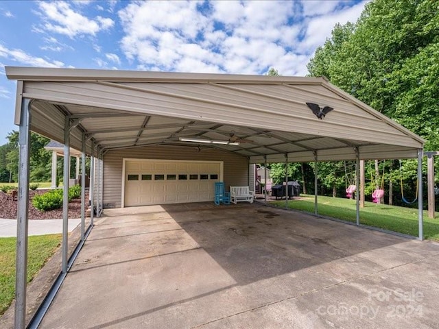 view of parking / parking lot with a garage, a lawn, and a carport