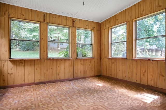 unfurnished sunroom with plenty of natural light