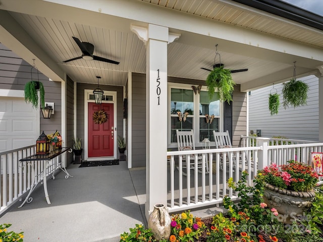 entrance to property with ceiling fan and covered porch