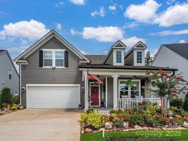 view of front of home with a porch and a garage