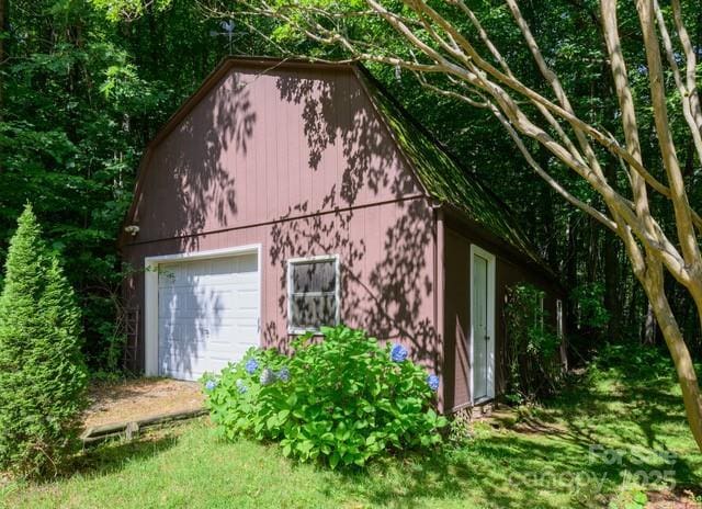 view of outbuilding with a garage