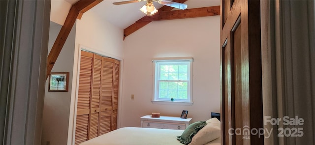 bedroom featuring ceiling fan, a closet, and lofted ceiling with beams