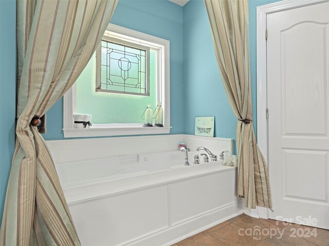 bathroom featuring tile patterned flooring