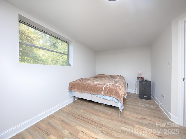 bedroom featuring light hardwood / wood-style floors