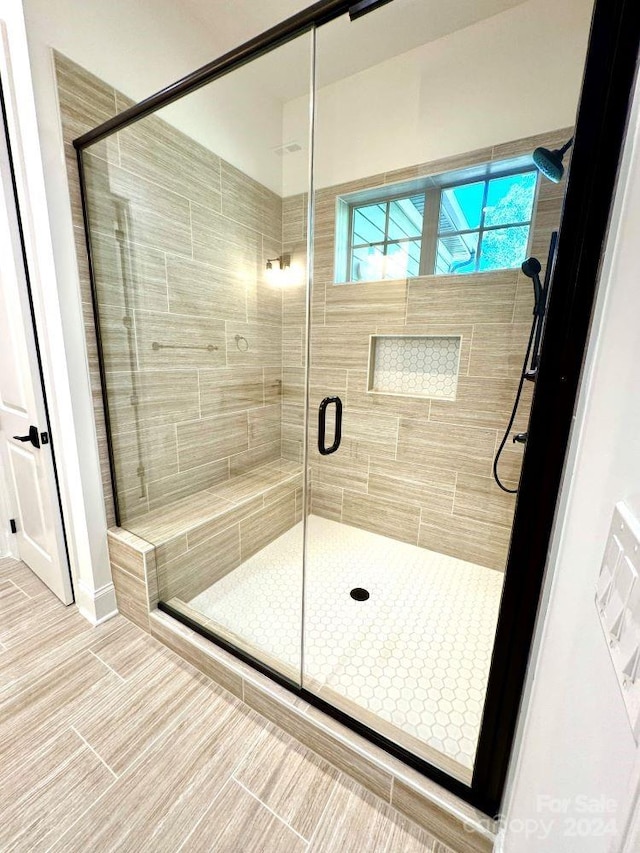 bathroom featuring walk in shower