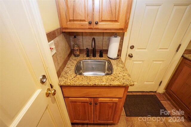 bathroom with sink and tile patterned floors