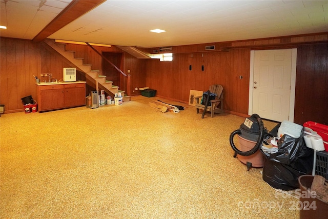 interior space featuring wooden walls