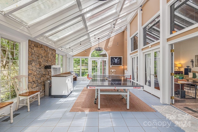 sunroom with french doors and vaulted ceiling