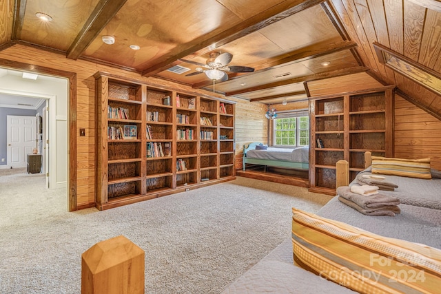 living area featuring wooden ceiling, carpet flooring, and wood walls