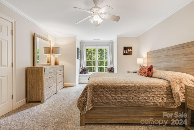 bedroom featuring ceiling fan, light colored carpet, and ornamental molding