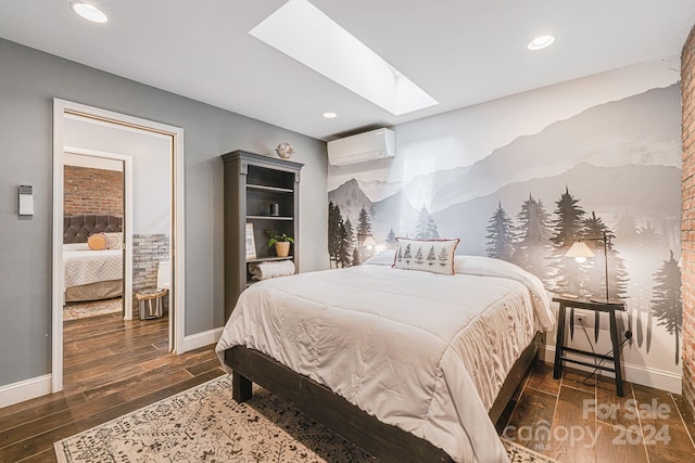 bedroom featuring a skylight and an AC wall unit