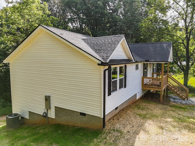 view of home's exterior with central AC