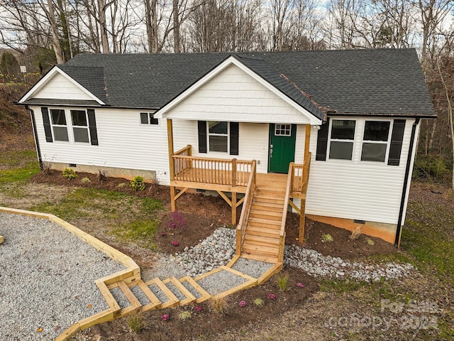 view of front of property featuring a deck