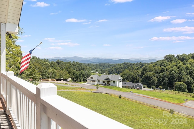 mountain view featuring a wooded view