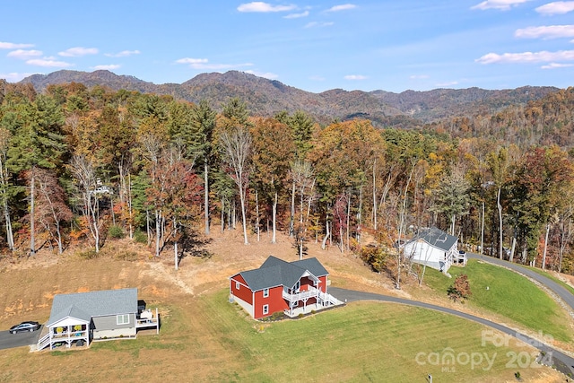 aerial view featuring a mountain view and a wooded view