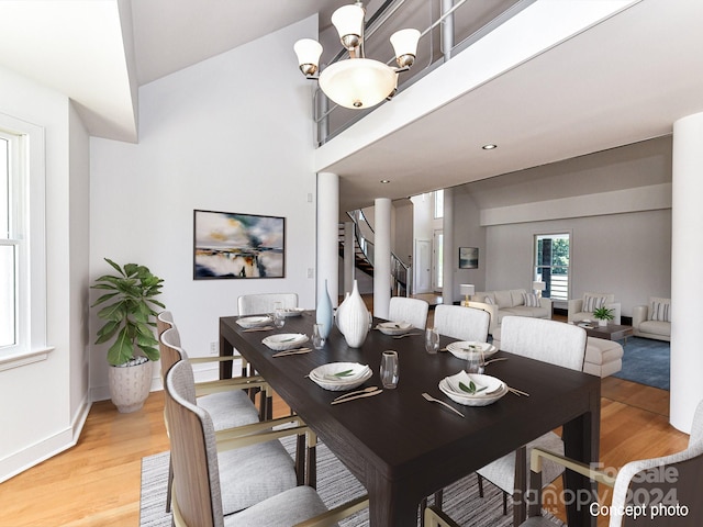 dining area with an inviting chandelier and light wood-type flooring