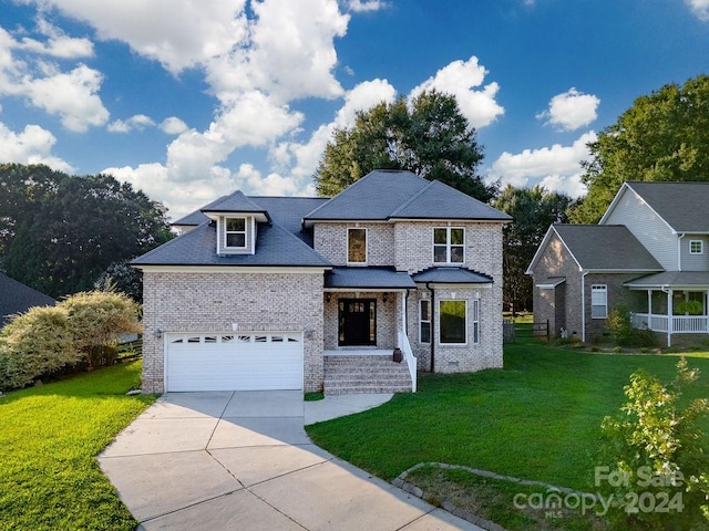 view of front of property with a front yard and covered porch