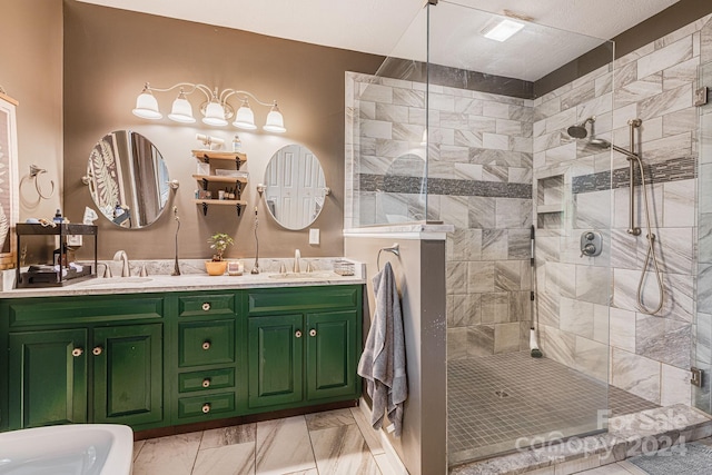 bathroom with vanity and a tile shower