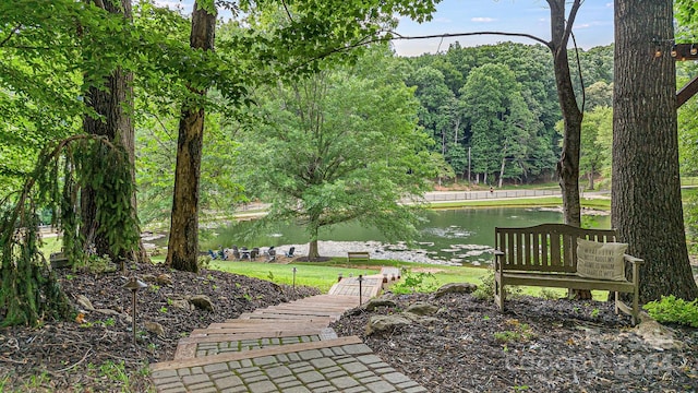 view of home's community featuring a water view