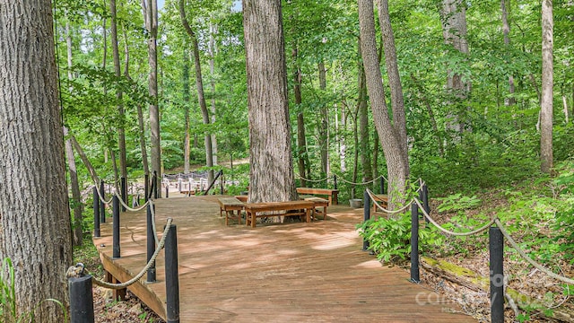 view of property's community featuring a wooden deck