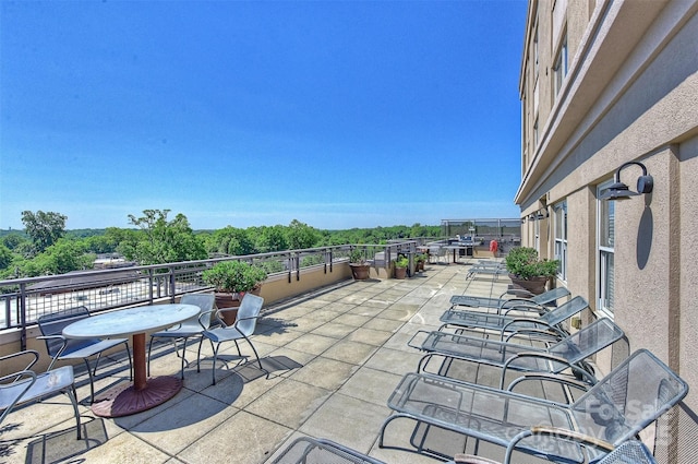 view of patio / terrace with a balcony