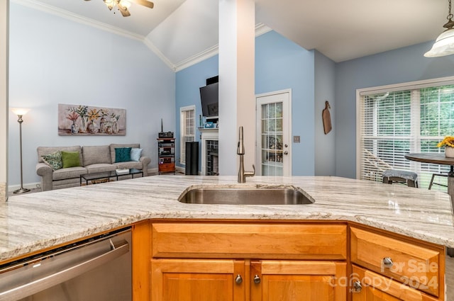 kitchen with vaulted ceiling, sink, ornamental molding, stainless steel dishwasher, and light stone counters