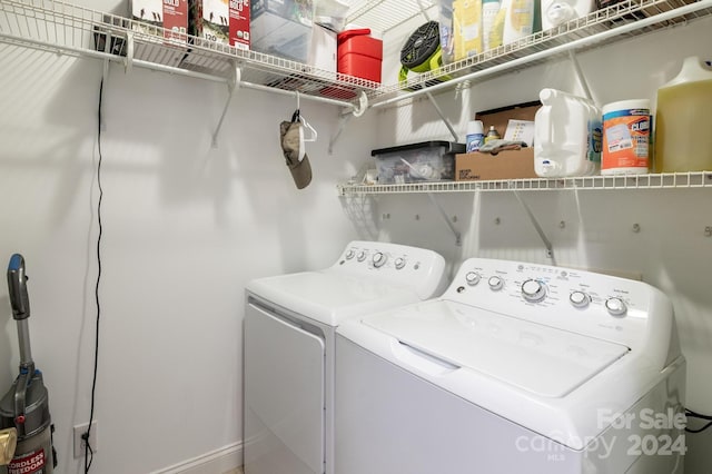 laundry room with washer and clothes dryer