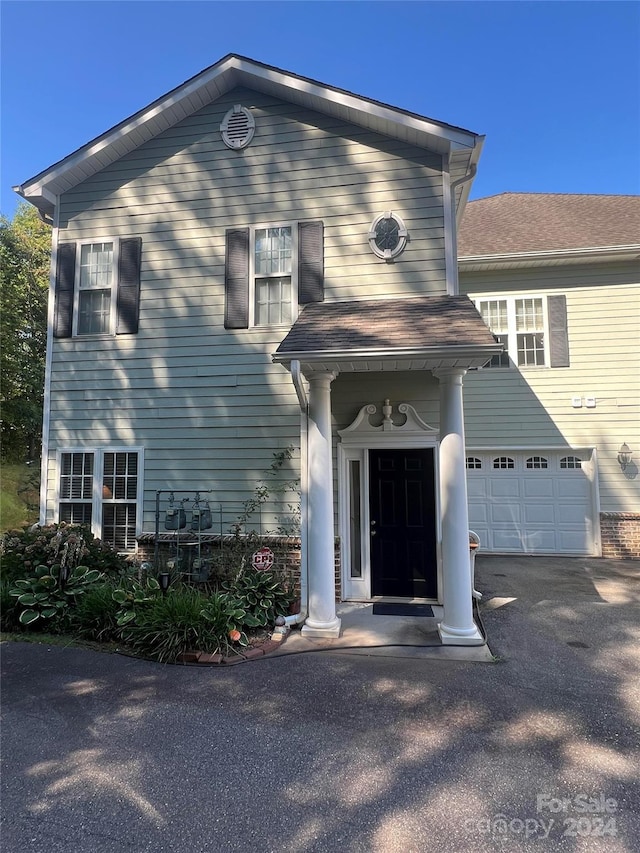 view of front of house with a garage