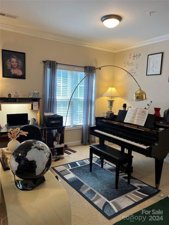 sitting room with crown molding and carpet flooring