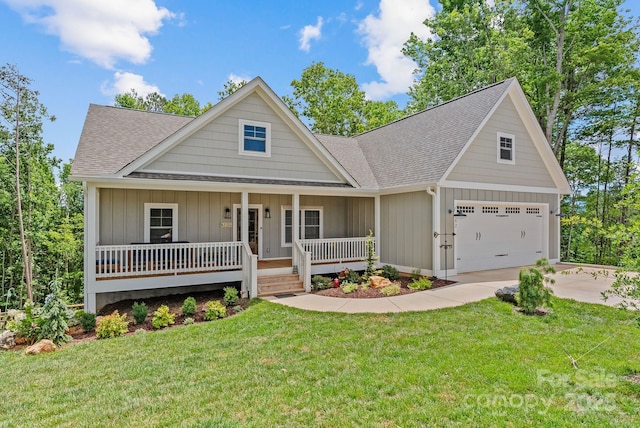 view of front of house with roof with shingles, covered porch, concrete driveway, and a front lawn