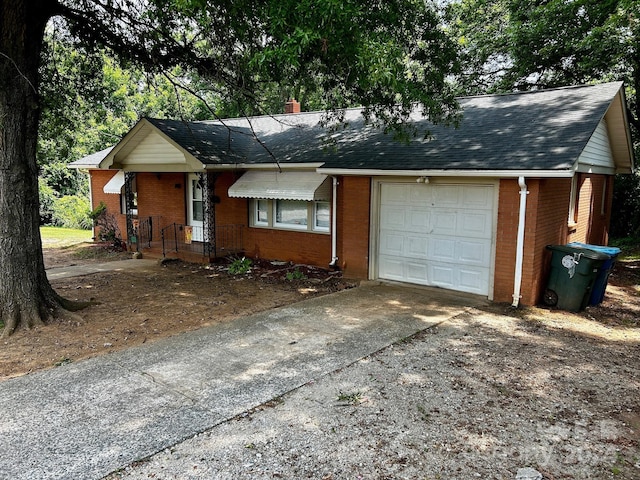 ranch-style home with a garage